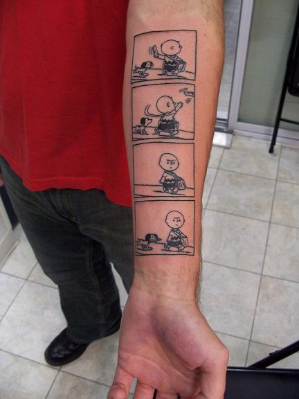 Jeff sent us this picture of his wife Heather's Snoopy tattoo (her first,